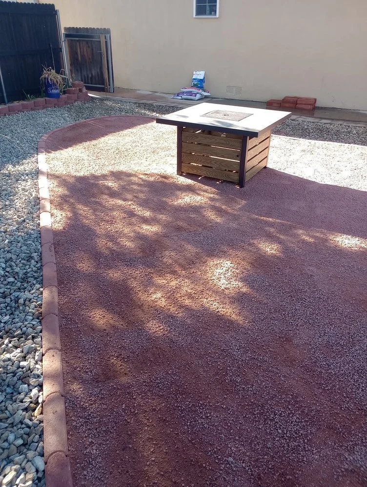 Priddy Landscaping and Irrigation completing a gravel yard upgrade near Fairway Drive in Farmington NM