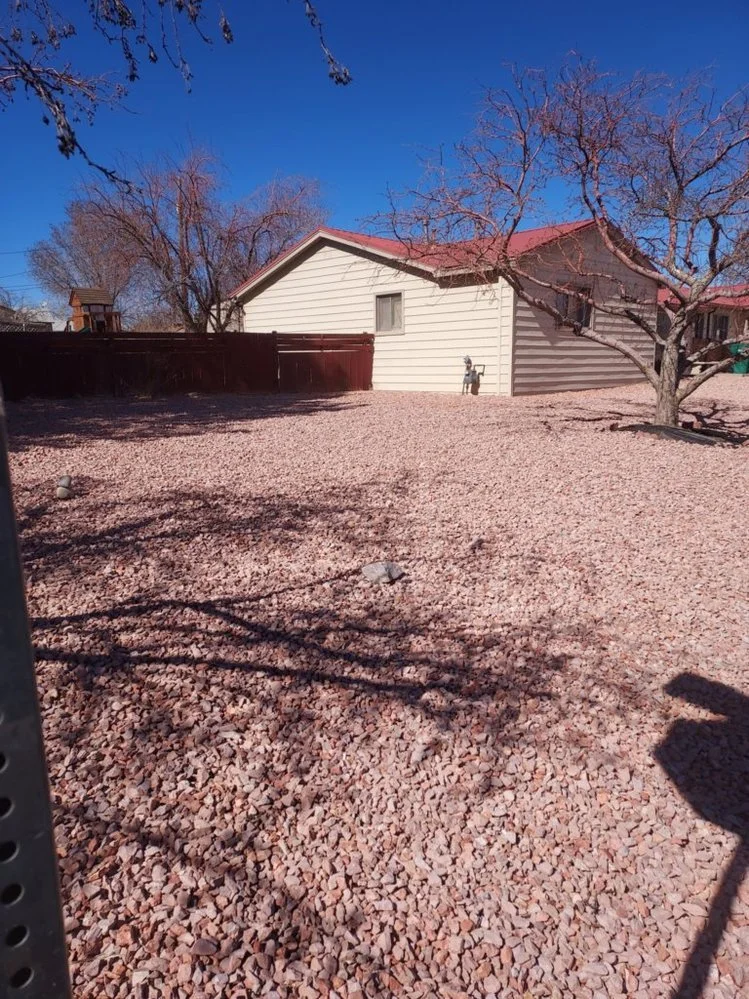 Decorative gravel landscaping completed by Priddy Landscaping and Irrigation near Las Brisas Trail in Farmington NM