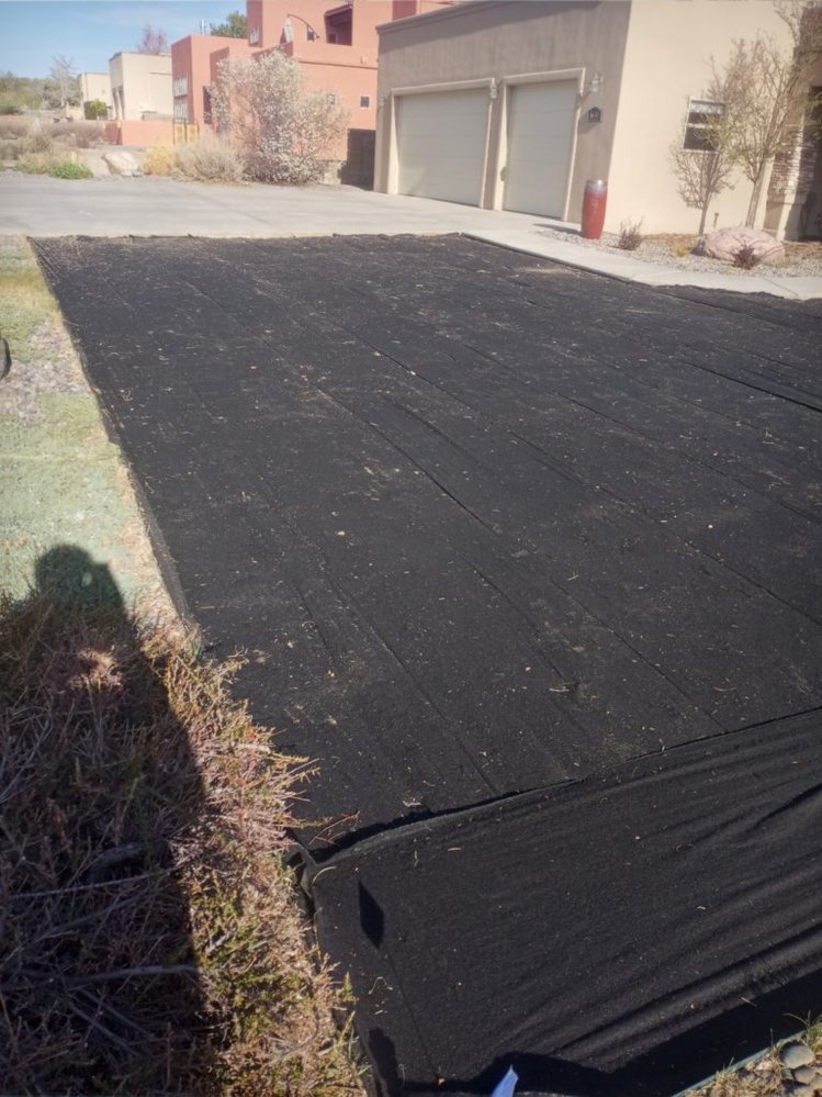 Residential gravel landscaping completed by Priddy Landscaping and Irrigation on Linda Lane in Farmington NM