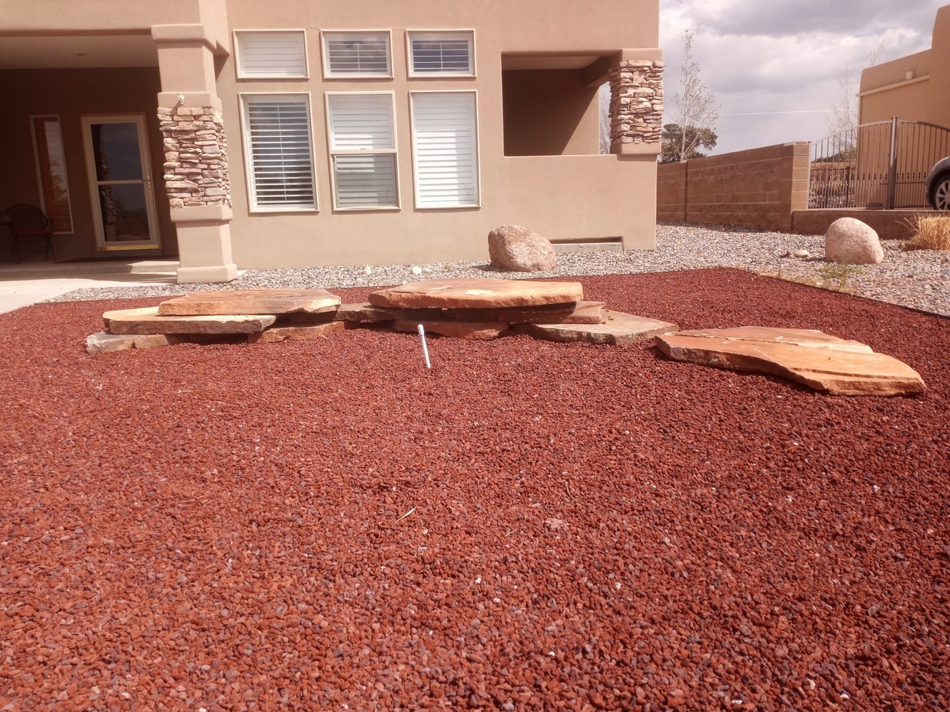 Gravel yard cleanup and edging completed near Hallmarc Drive in Farmington NM