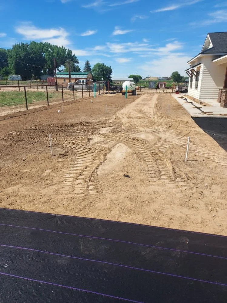 Professional gravel yard installation by Priddy Landscaping and Irrigation on Sullivan Road in Bloomfield NM