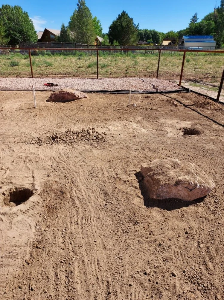 Decorative gravel yard completed near Via Del Oro Drive main entrance in Farmington NM