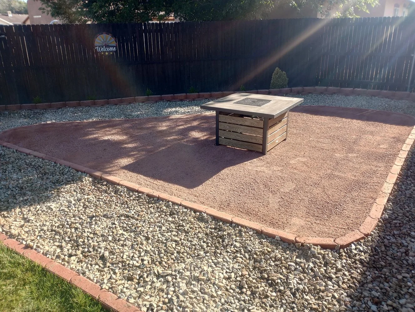 Residential gravel yard completed by Priddy Landscaping and Irrigation along Linda Lane in Farmington NM