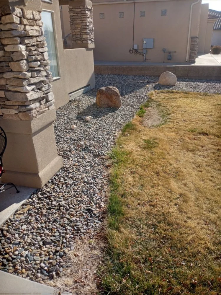 Professional gravel yard installation by Priddy Landscaping and Irrigation on Sullivan Road in Bloomfield NM