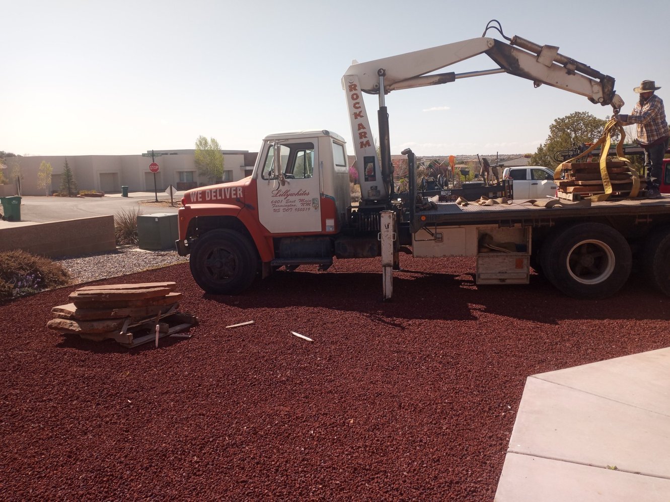 Decorative gravel installation on Ash Avenue in Bloomfield NM by Priddy Landscaping and Irrigation