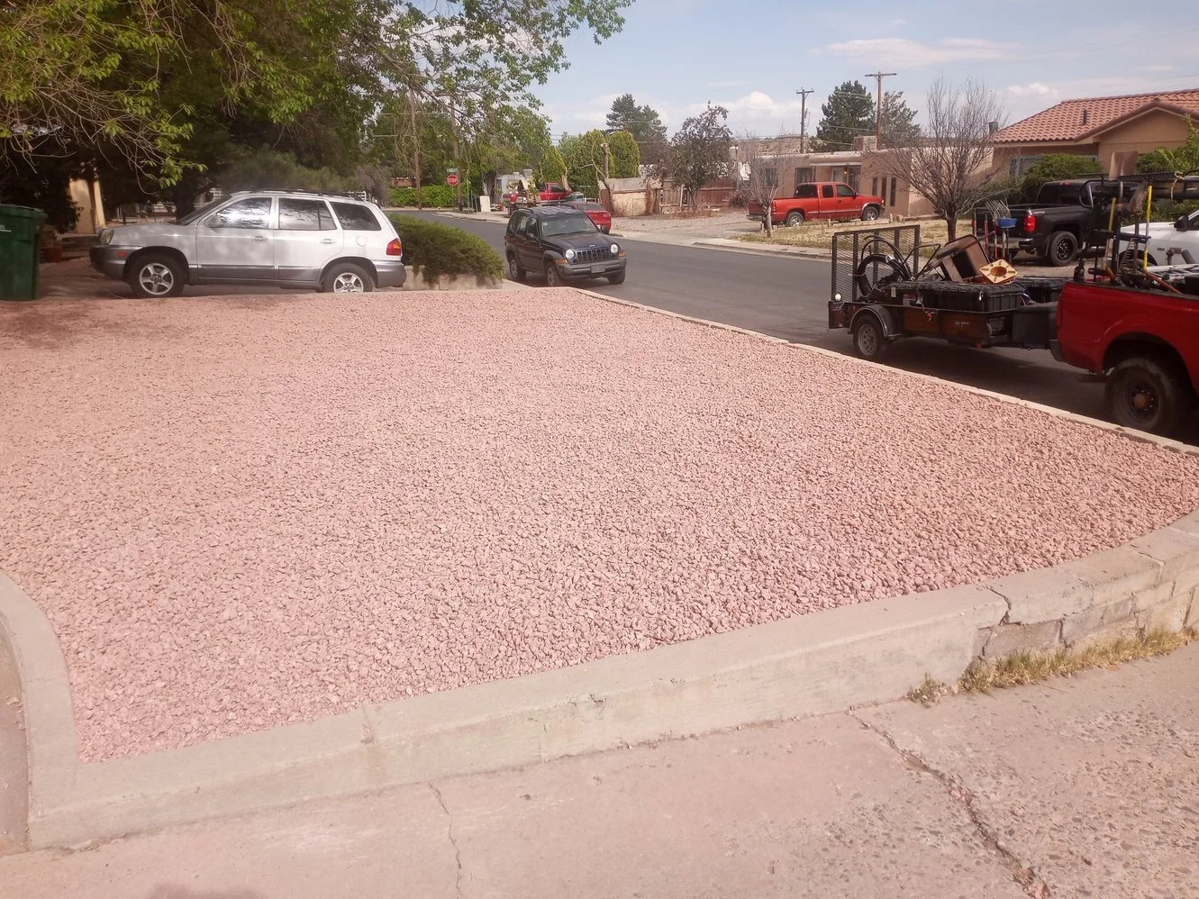 Residential gravel yard completed by Priddy Landscaping and Irrigation along Linda Lane in Farmington NM