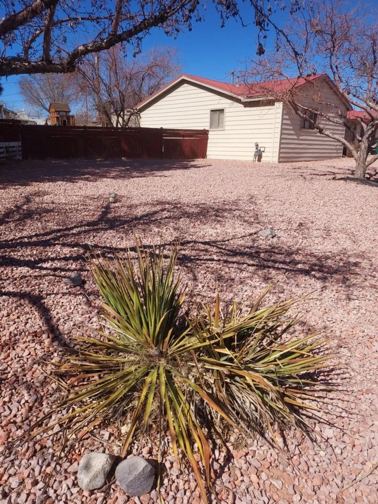 Gravel landscaping work completed along Foothills Drive in Farmington NM by Priddy Landscaping and Irrigation