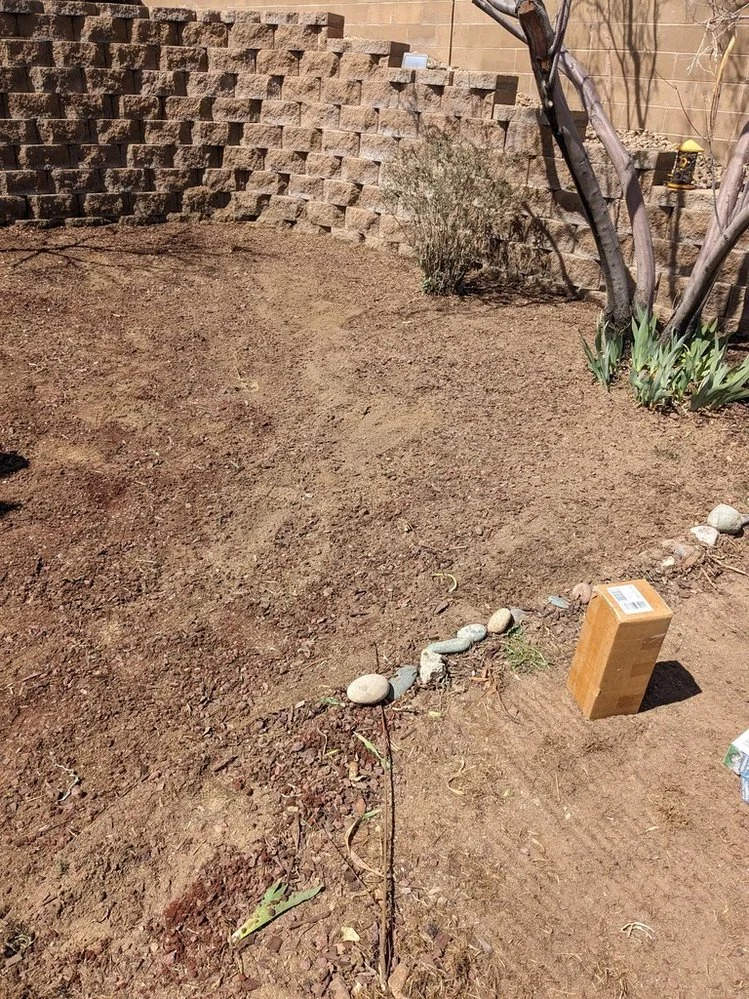 Decorative gravel landscaping completed by Priddy Landscaping and Irrigation near Logans Cove Place in Farmington NM