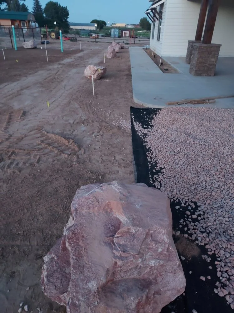 Front yard gravel landscaping on Baird Circle in Aztec NM by Priddy Landscaping and Irrigation