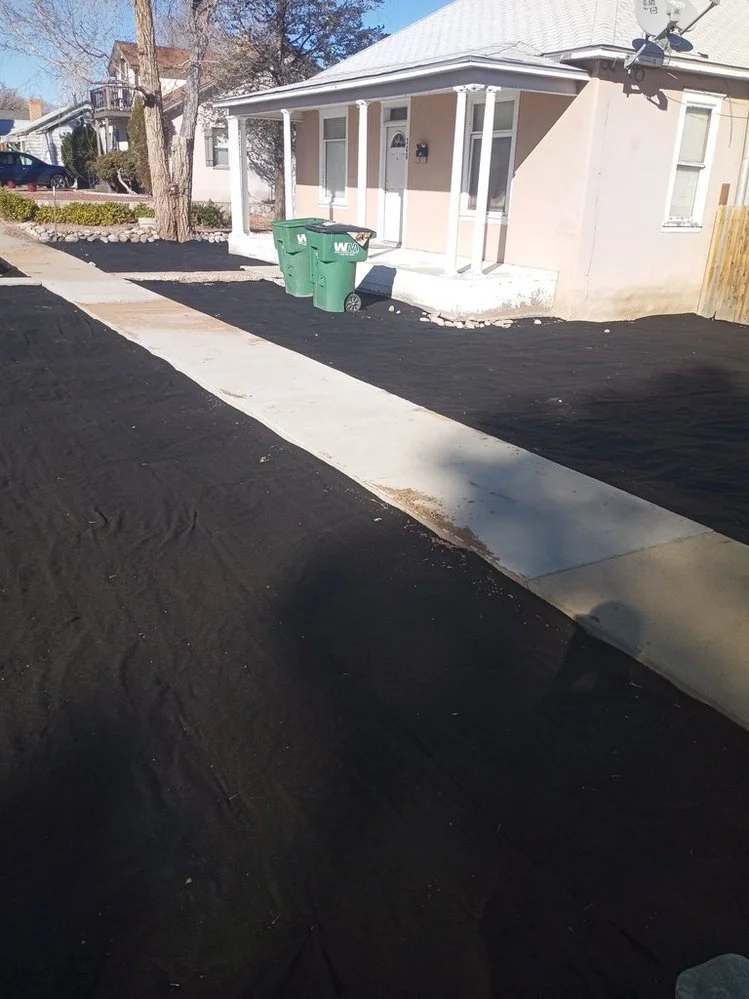 Front yard gravel refresh completed by Priddy Landscaping and Irrigation along Hallmarc Drive in Farmington NM
