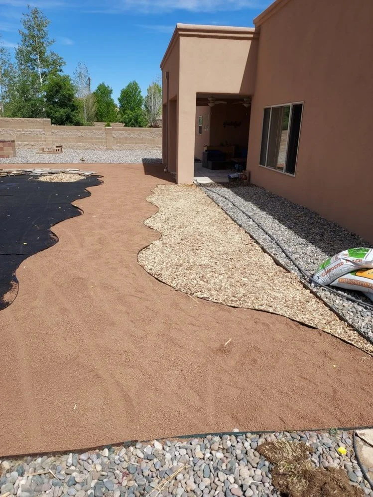 Decorative gravel landscaping on Chaco Street in Aztec NM by Priddy Landscaping and Irrigation