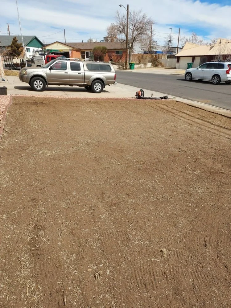 Priddy Landscaping and Irrigation completing a gravel yard install on Via Del Oro Drive in Farmington NM