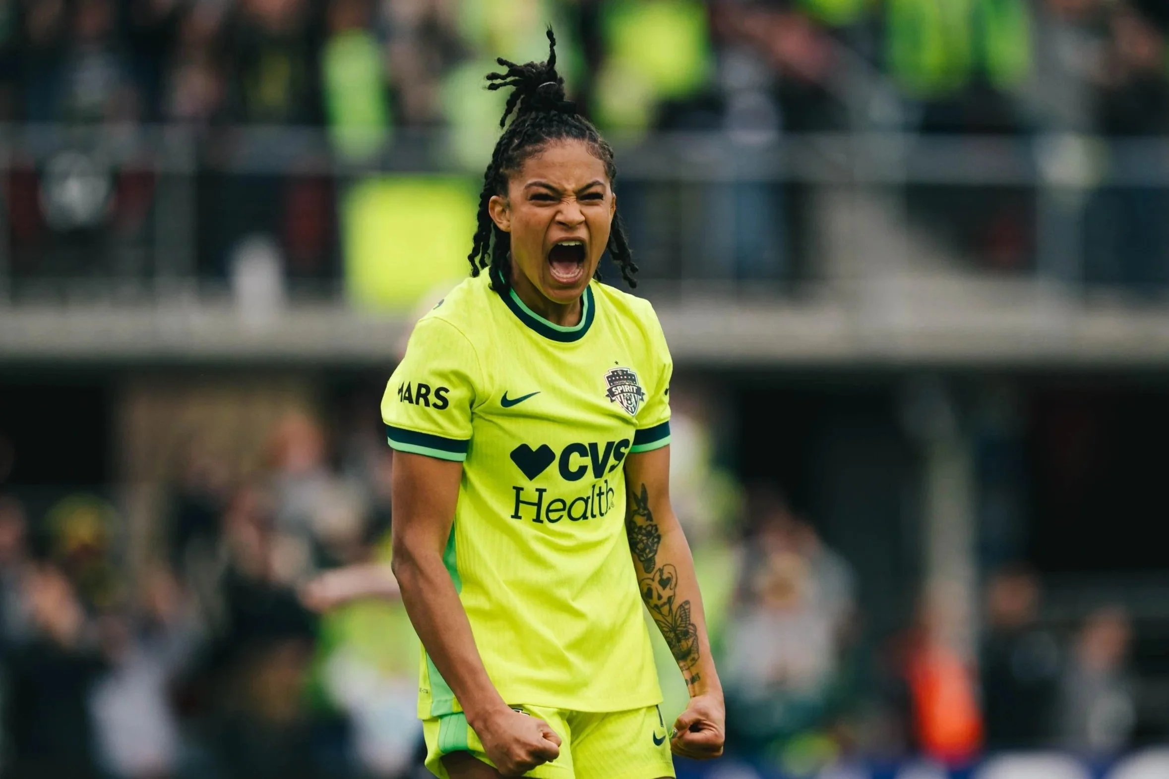 Croix Bethune screams in celebration for the Washington Spirit