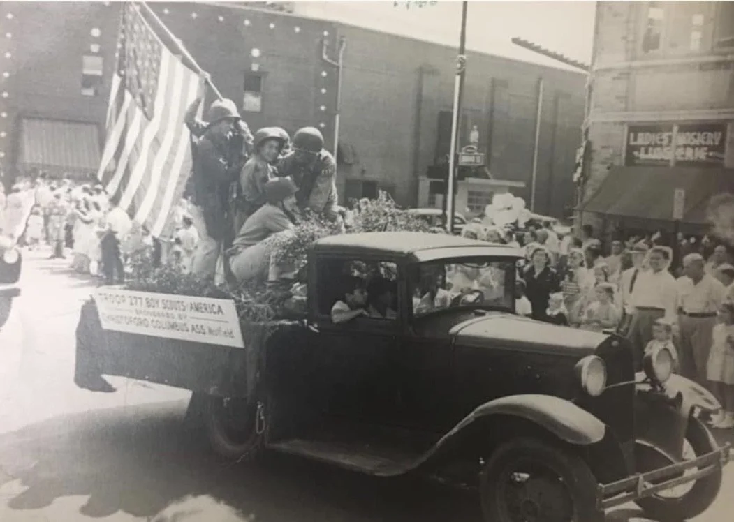 Local Boy Scouts gather in front of the Rialto Theatre, circa 1940s.