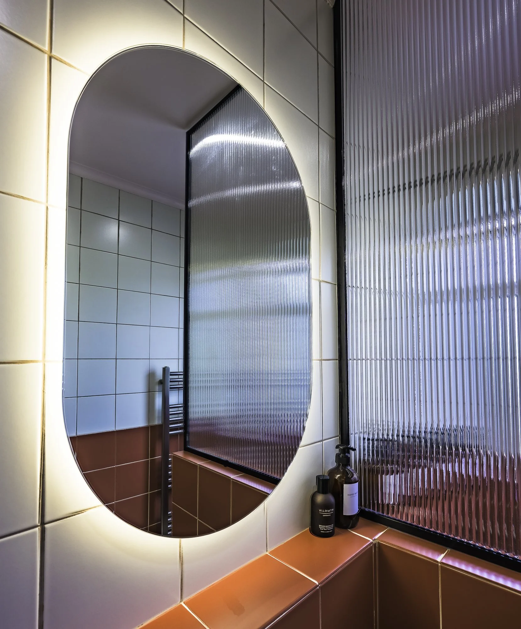 Back lit heated mirror 