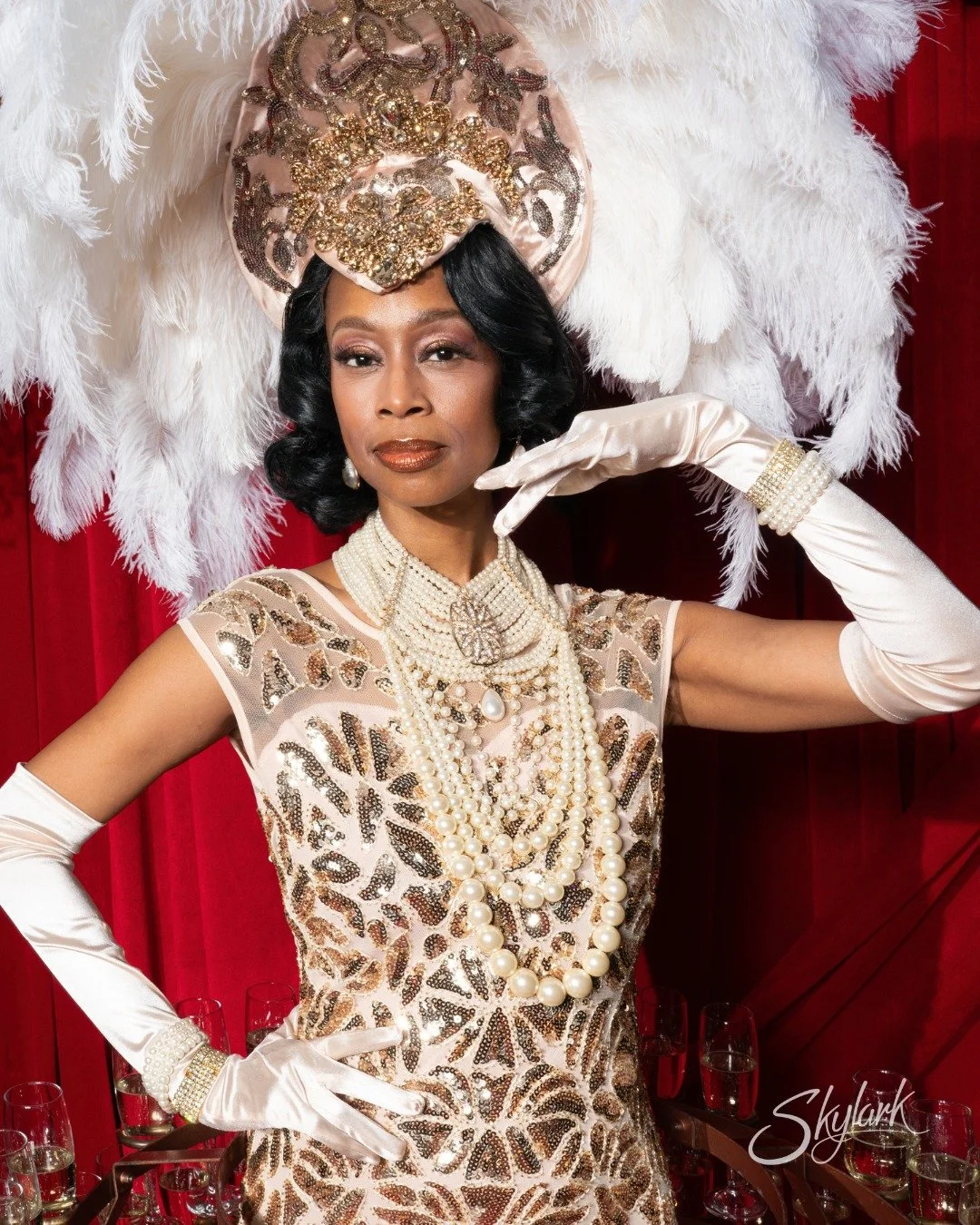 Nothing says Hollywood glam like our flapper showgirl costume and champagne skirt. 🥂

Guests are greeted by pearls, feathers, and sparkle. Step into another time and grab a drink and a smile with a real-life showgirl at your next event. ✨
#dcevents 