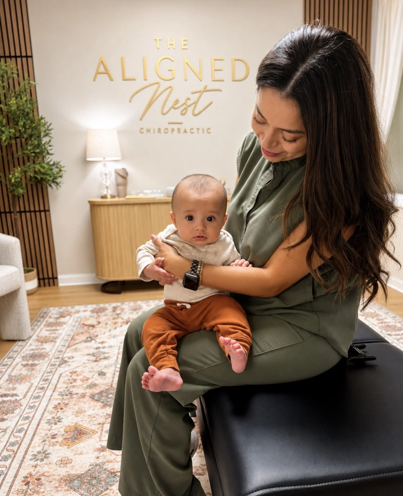 Pediatric chiropractic visit at The Aligned Nest Chiropractic in Altamonte Springs, Florida with a baby receiving gentle, neurologically focused care