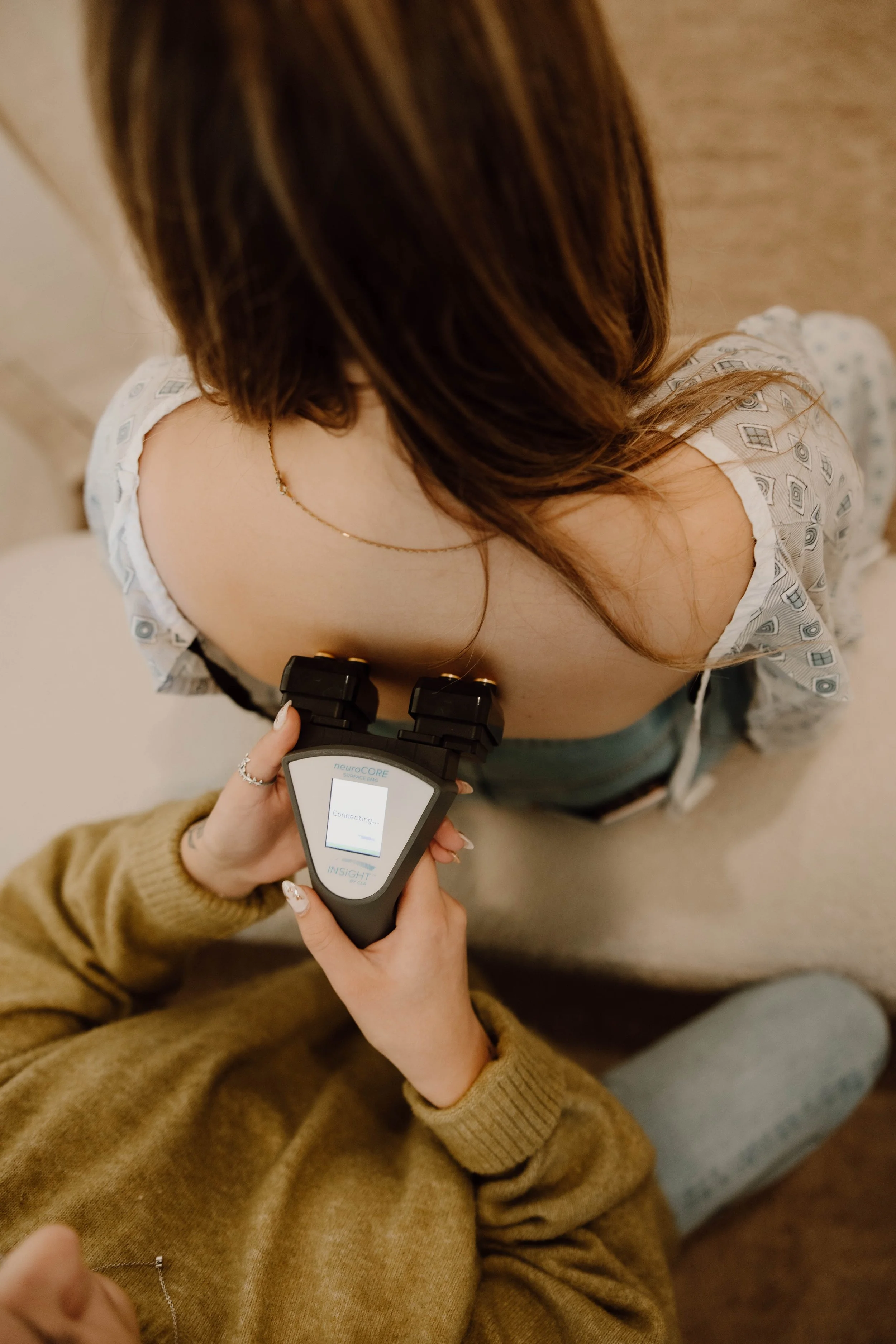 Prenatal nervous system scan during a chiropractic evaluation in Altamonte Springs, FL