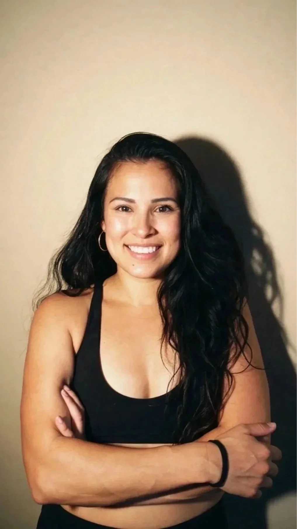 Christina aka Stina is a  community builder and lifelong athlete who believes movement has the power to shift the body, mind, and spirit. Since beginning her teaching journey in 2020, she’s built a diverse background in Pilates, yoga, VersaClimb, box