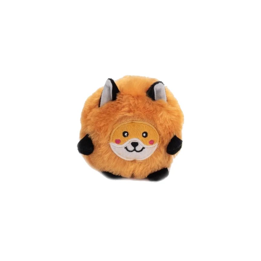 A fuzzy plush toy shaped like a round orange fox with embroidered facial features, black tips on the ears and paws, and a cute smile.
