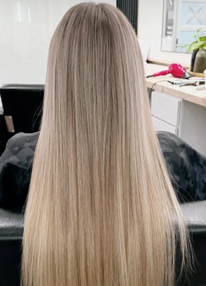 Two rows of hand-tied extensions blended with lived-in blonde, North Phoenix