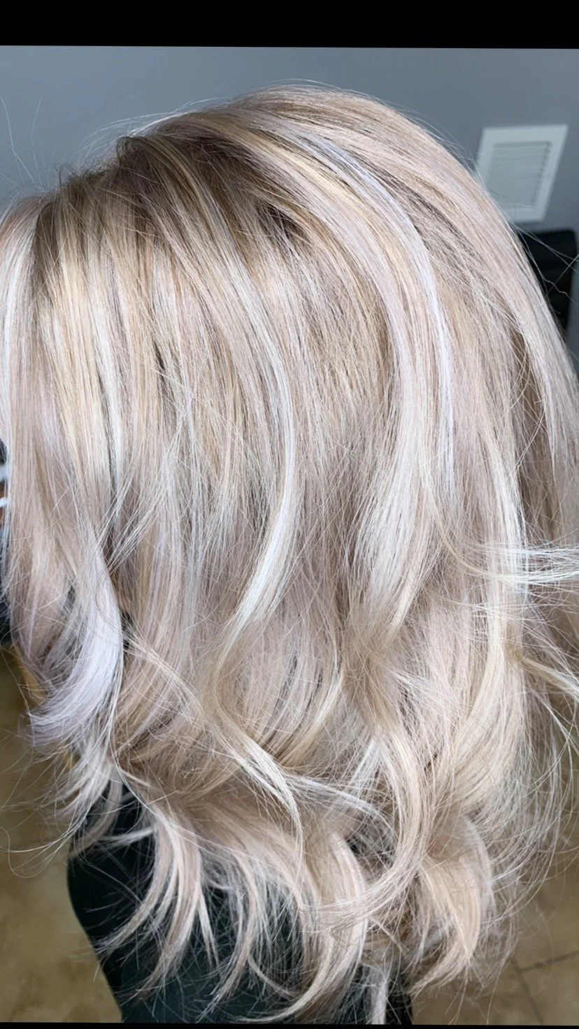 Icy dimensional blonde highlights with soft curls by Michael Joseph Hair, North Phoenix