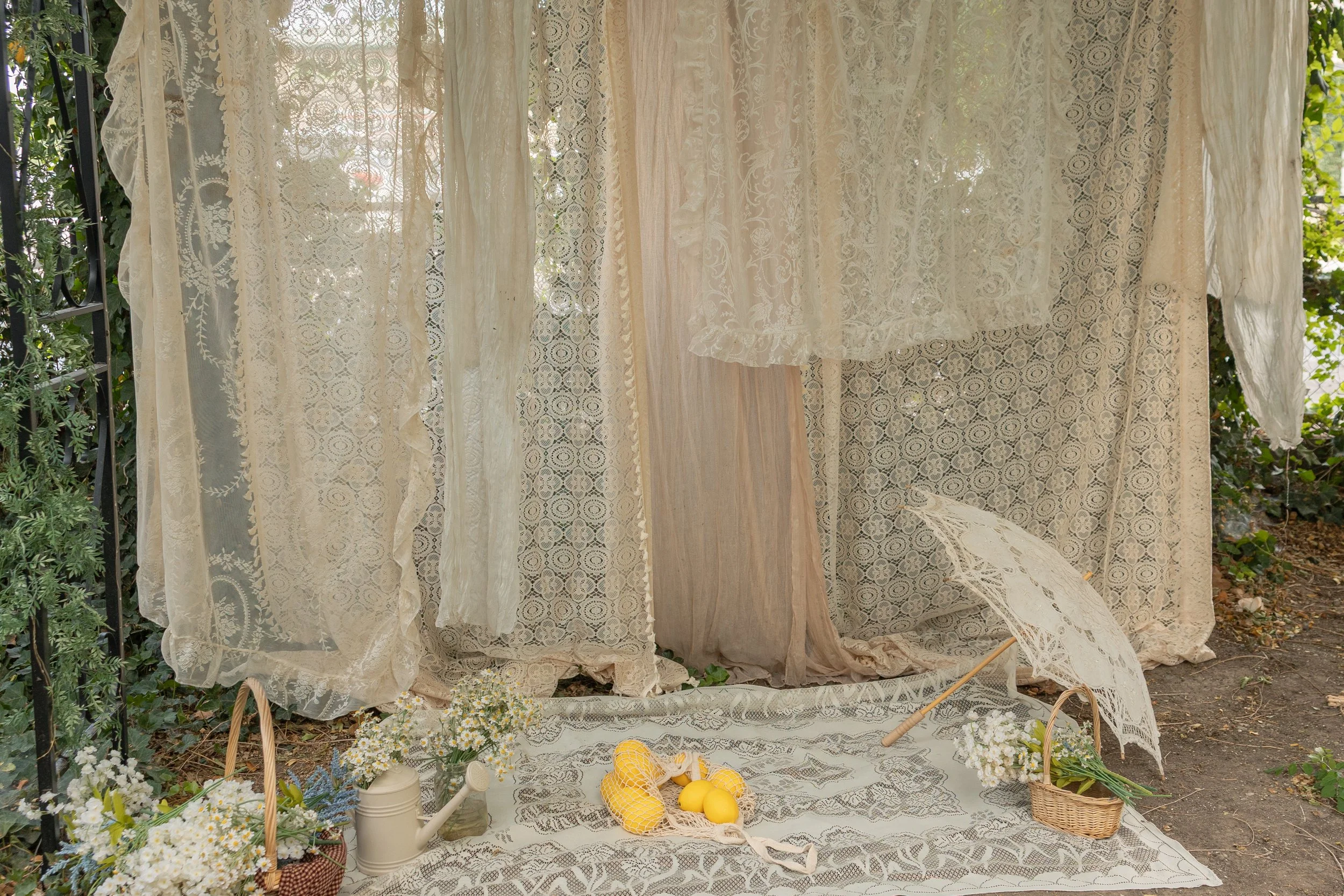 a cozy greenhouse photography studio with soft vintage touches. Natural light photography studio and event space in Lehi Utah. 