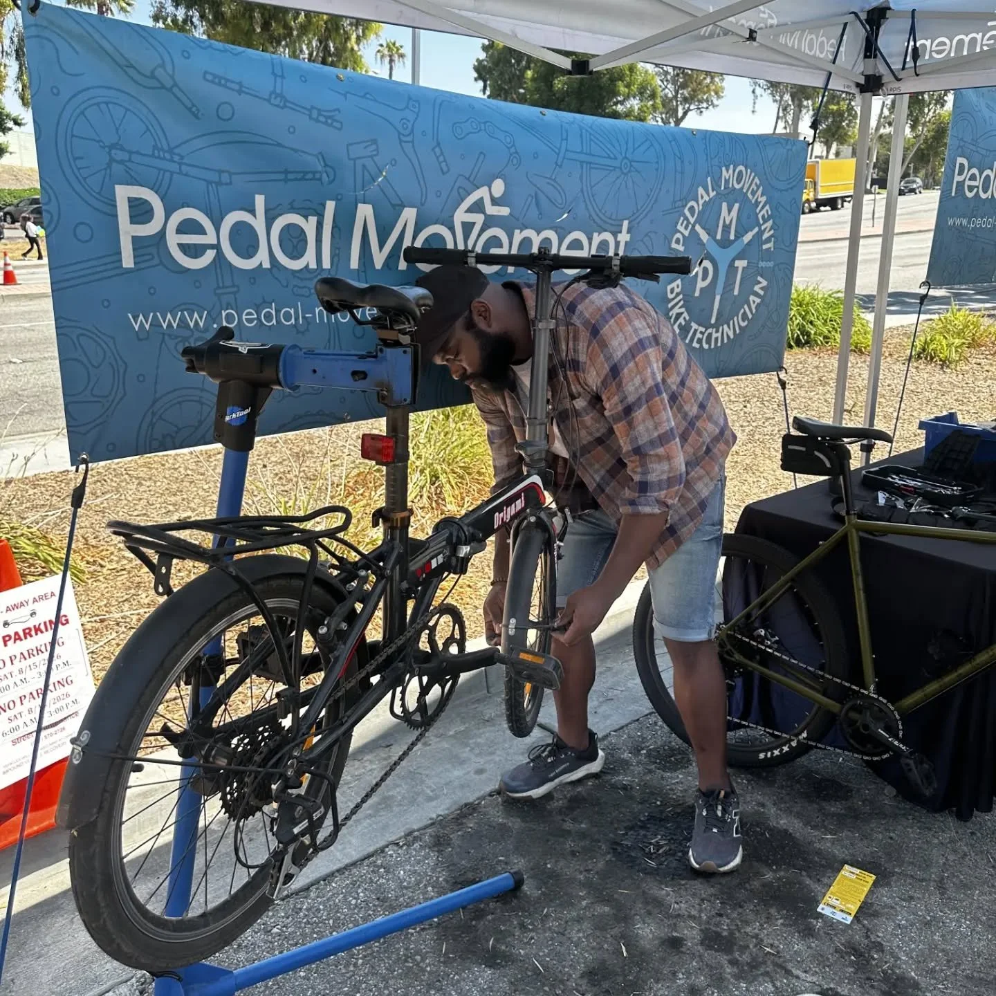 Another amazing year doing free bike repairs 🔧 ⚙️ with @tunuathrashntuklb at the backpack giveaway. There were games, school supplies, free haircuts, and inflatable furniture! Looking out for the youth is a MUST and we are always happy to partner wi