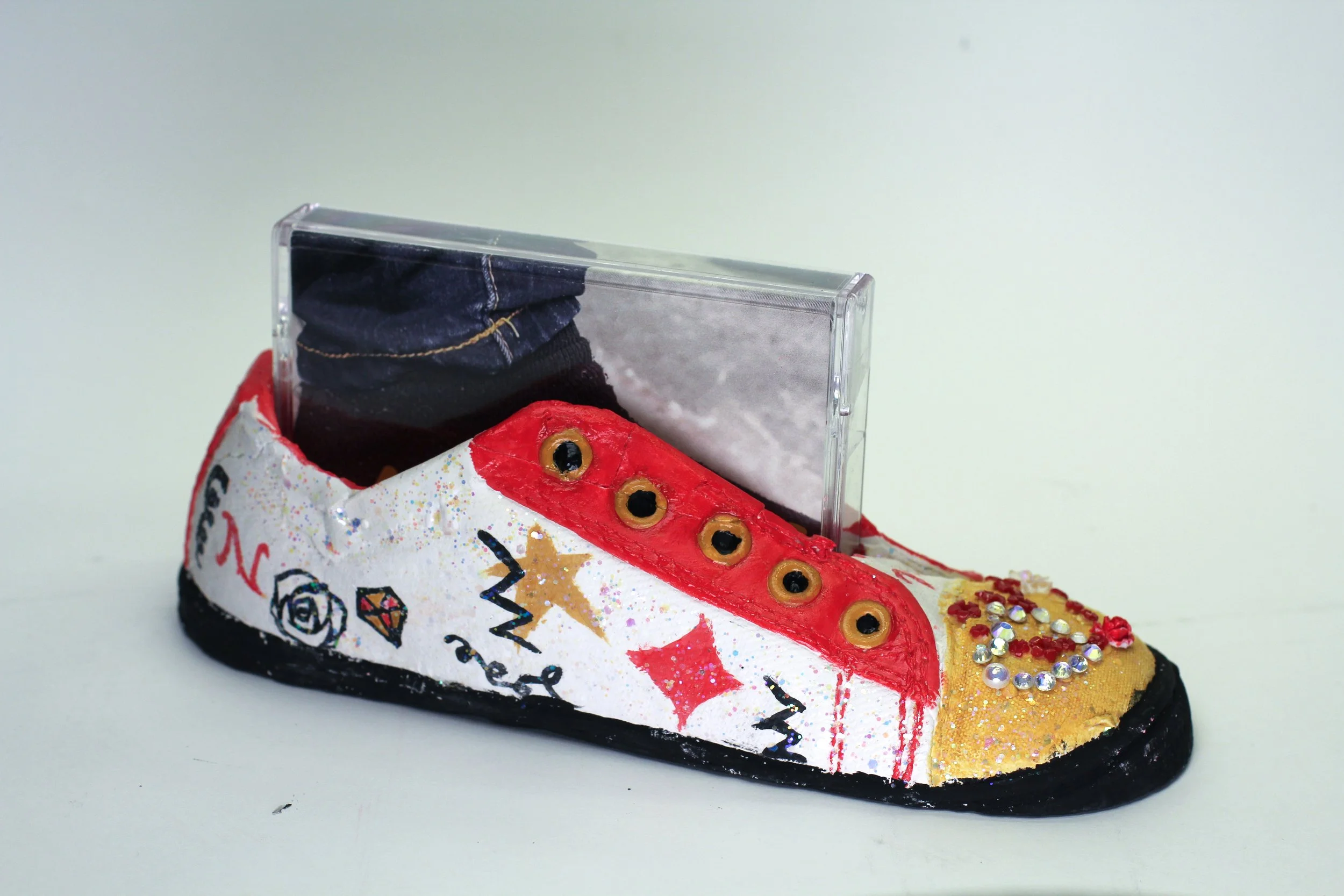 KaiOmi Tapes by Naomi Knight and Kai Chen -

Detail side view of Naomi's shoe/tape