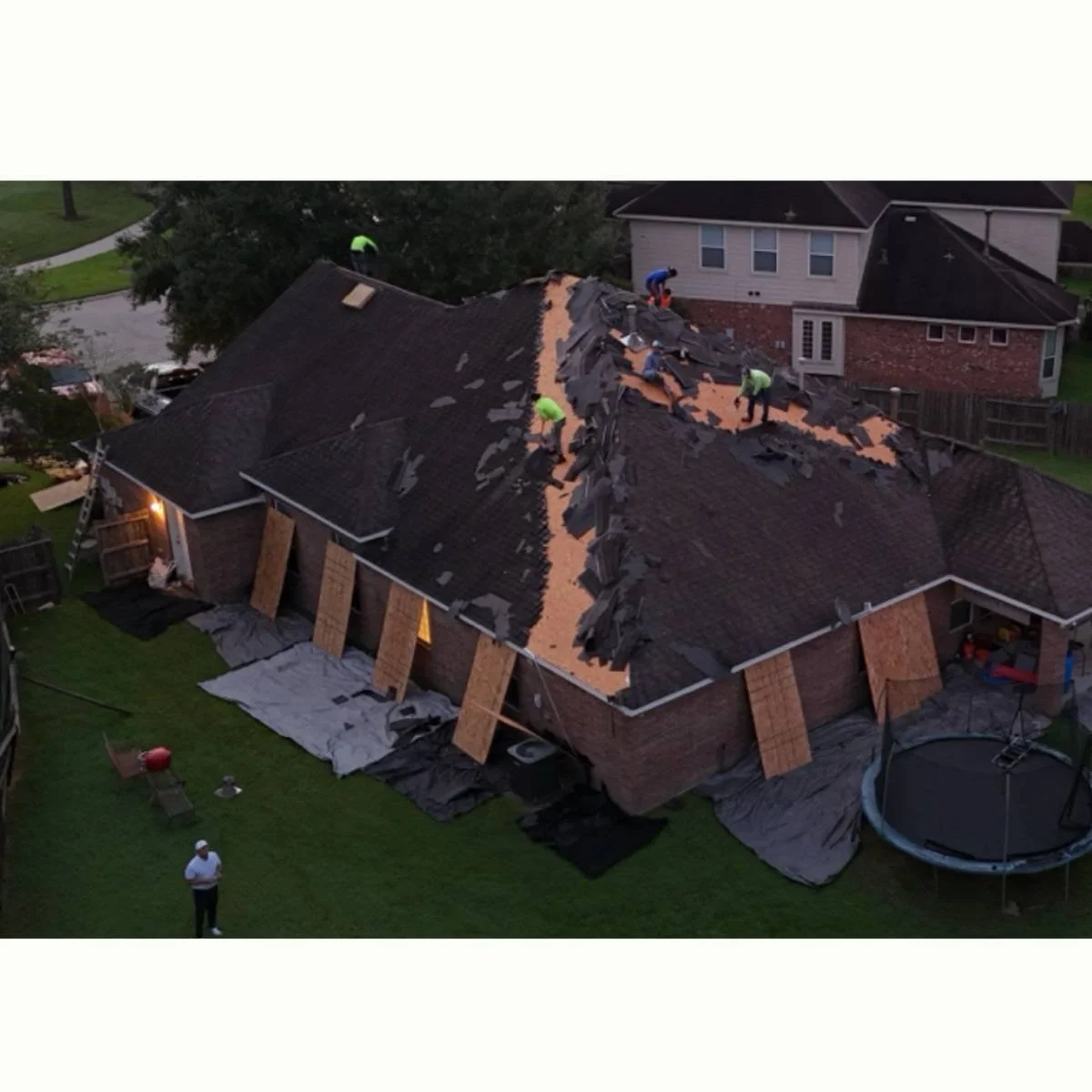 Aerial view of a Houston area home getting a complete roof replacement