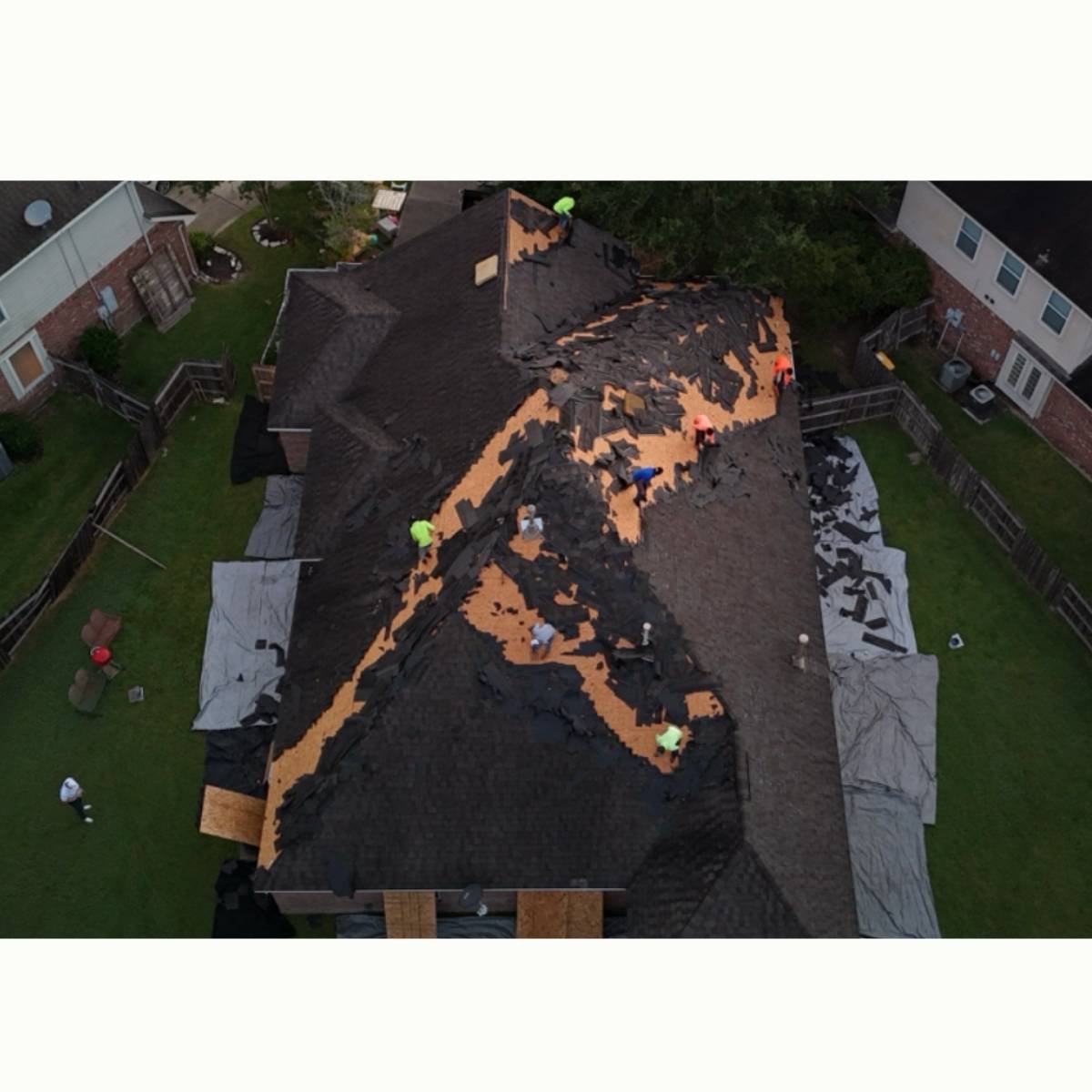 Another aerial shot of a Houston area home receiving a complete roof replacement