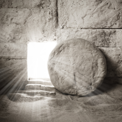 A large round stone inside a stone-built room with a small rectangular window letting light in.
