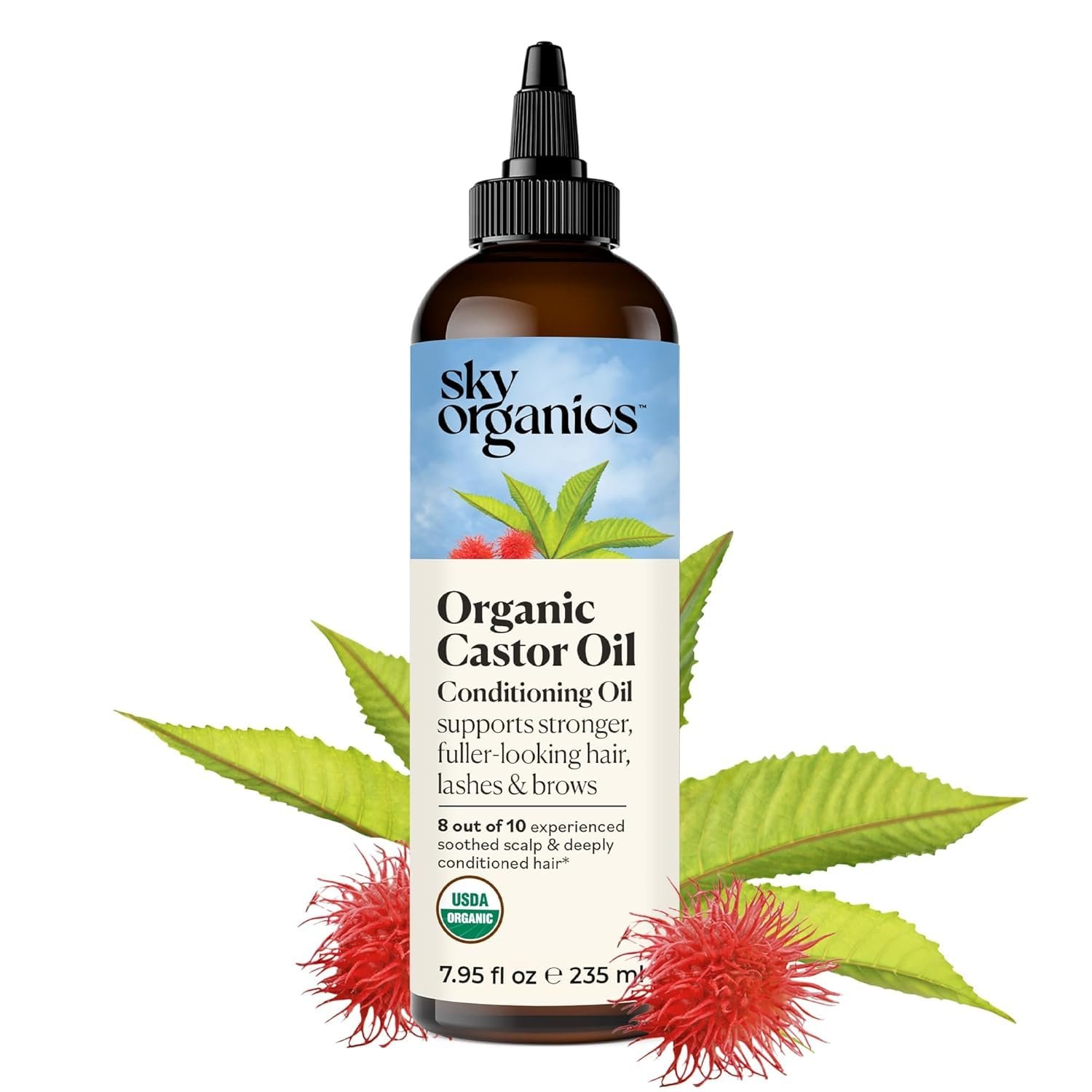 Bottle of Sky Organics Organic Castor Oil with green leaves and red castor beans around it.