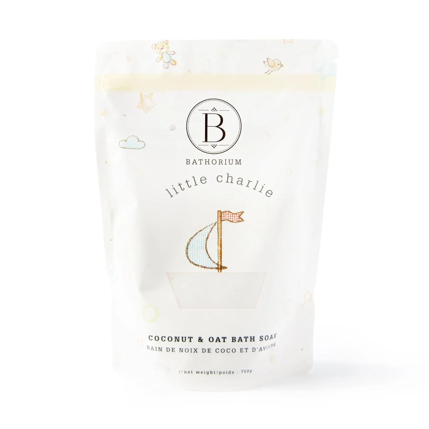 White bath soak packet with a sailboat illustration, and texts including 'Bathorium Little Charlie' and 'Coconut & Oat Bath Soap.'