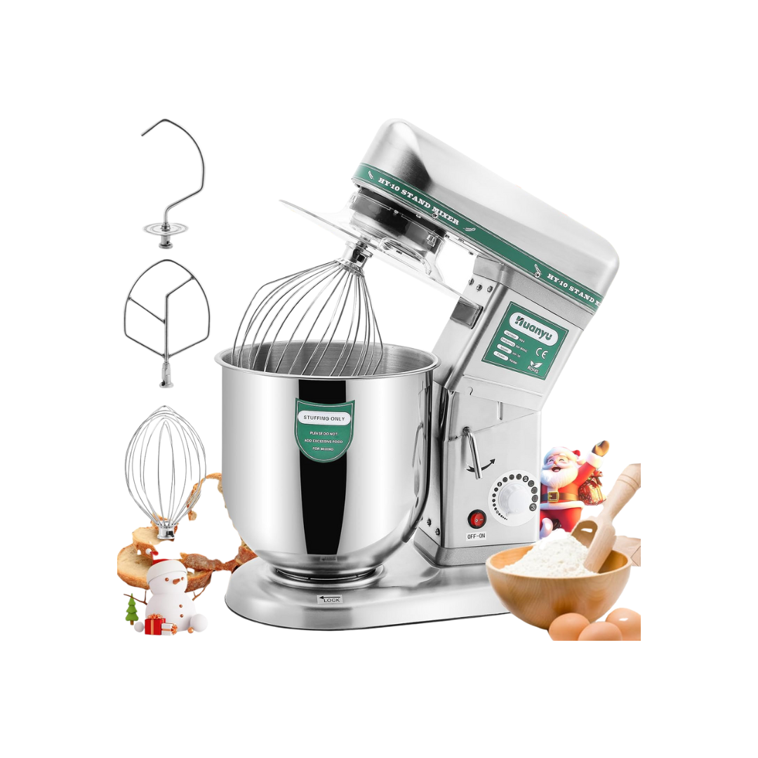 A white stand mixer with a metal mixing bowl and beaters, surrounded by Christmas-themed decorations including a snowman, Santa, cookies, flour in a wooden bowl, and eggs.