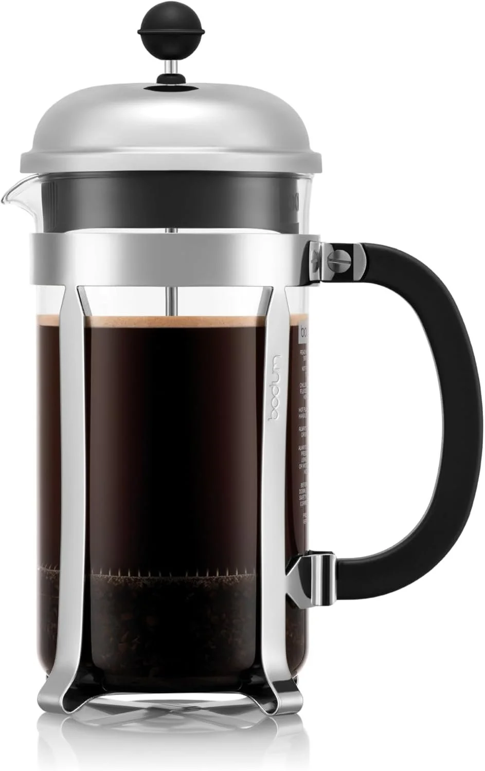 French press coffee maker filled with brewed coffee.