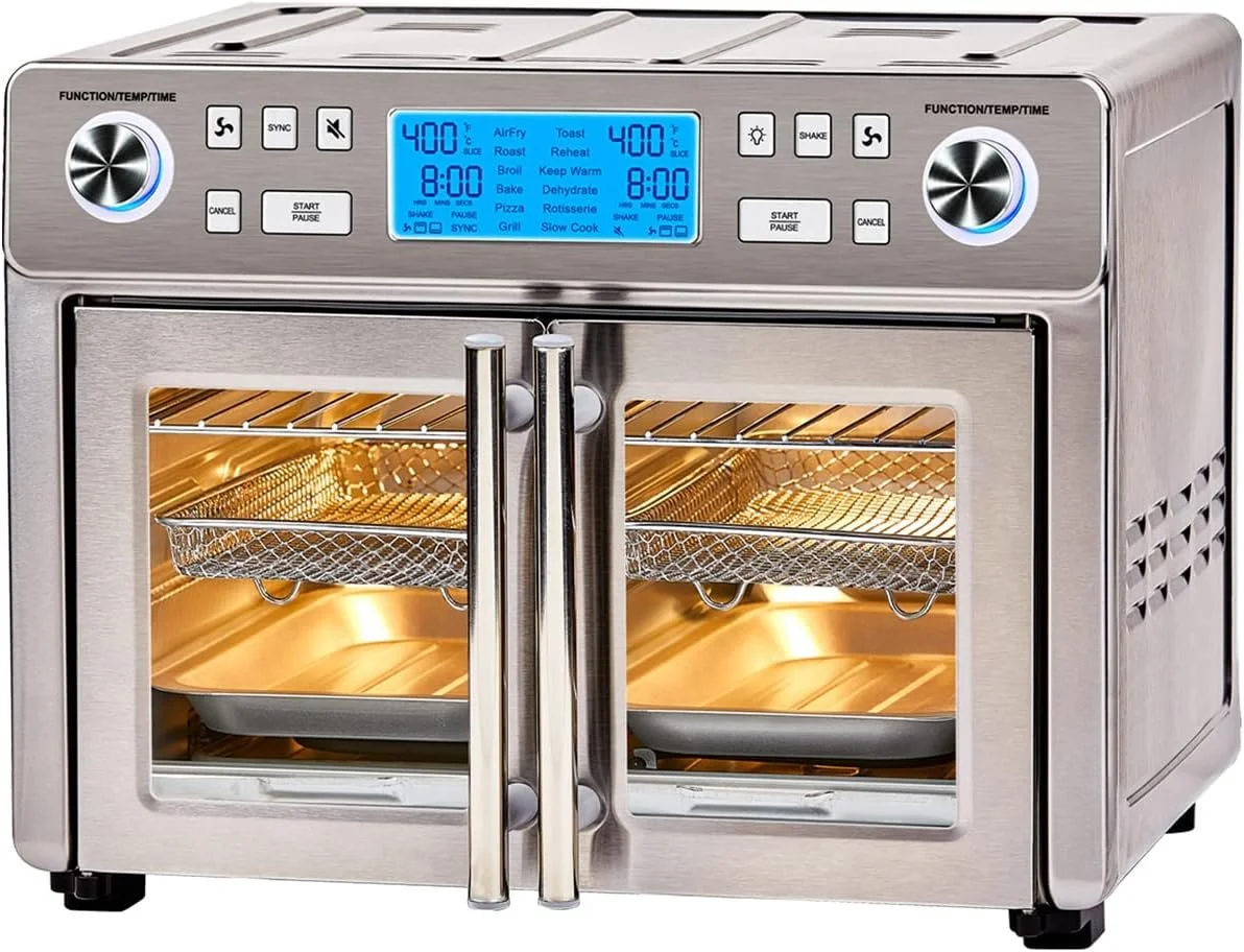 Stainless steel countertop convection oven with digital display and two glass doors, interior with racks and trays