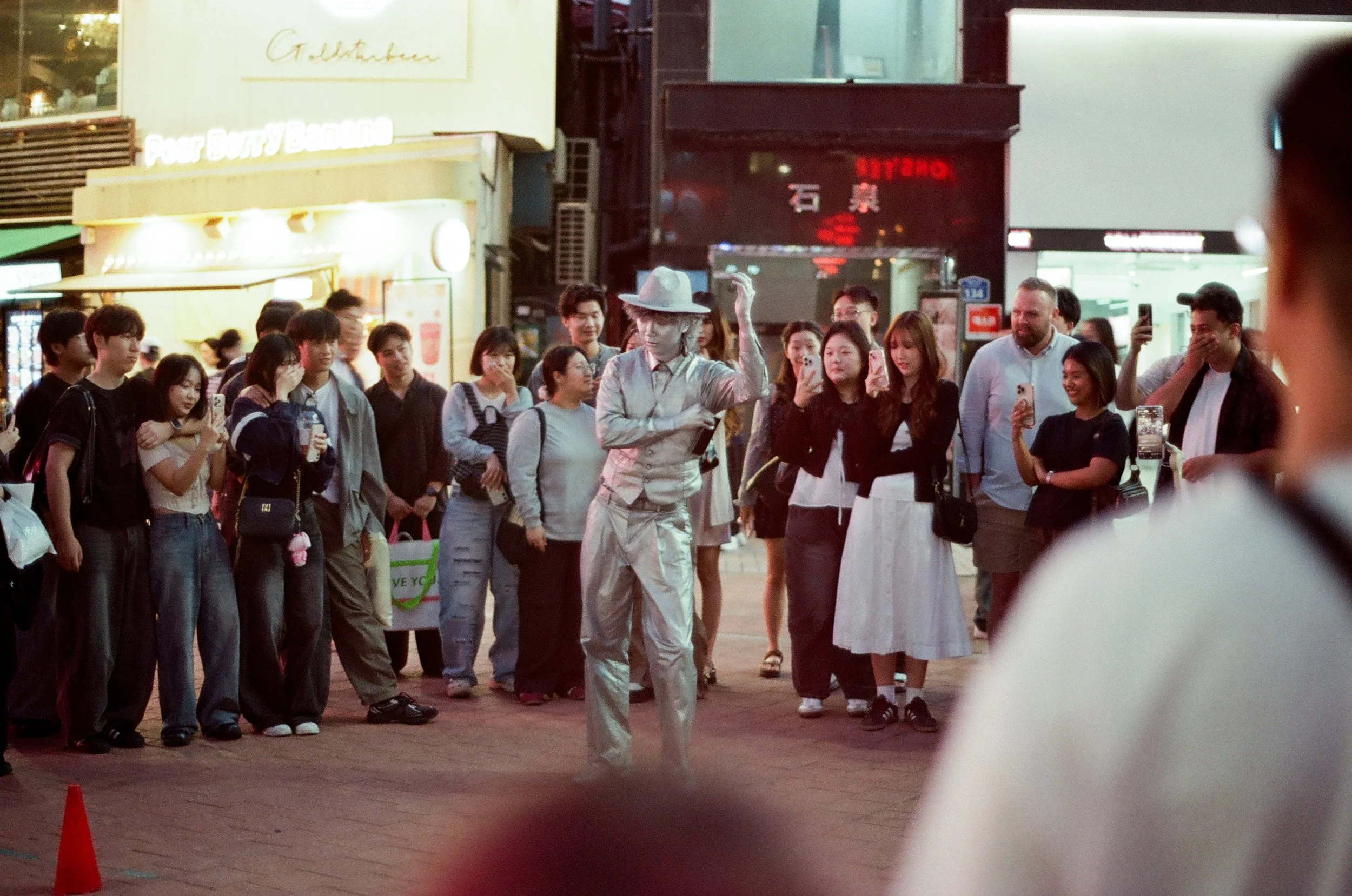 Film photo of a street performer in Hongdae, Seoul, South Korea