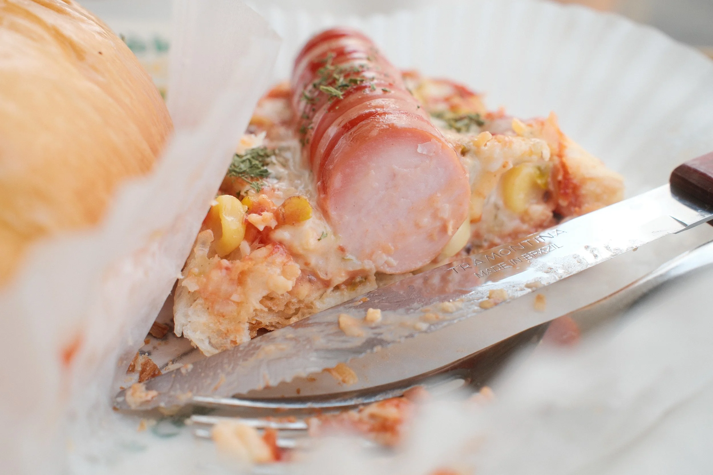 Detail shot of the Sausage Pizza Hot Dog