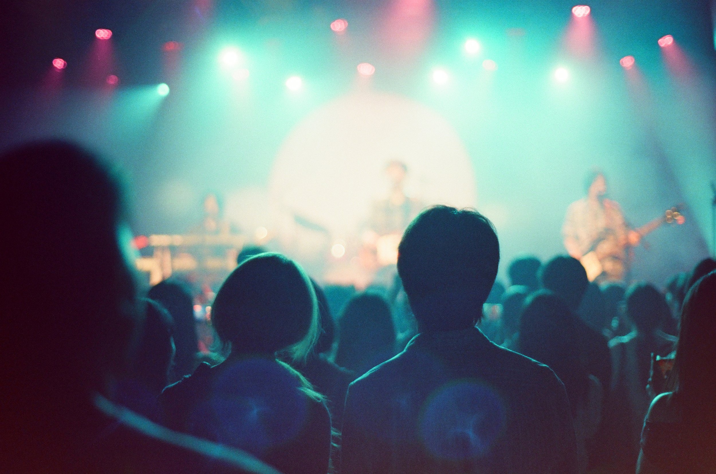 Film photograph of a concert taken from within the crowd