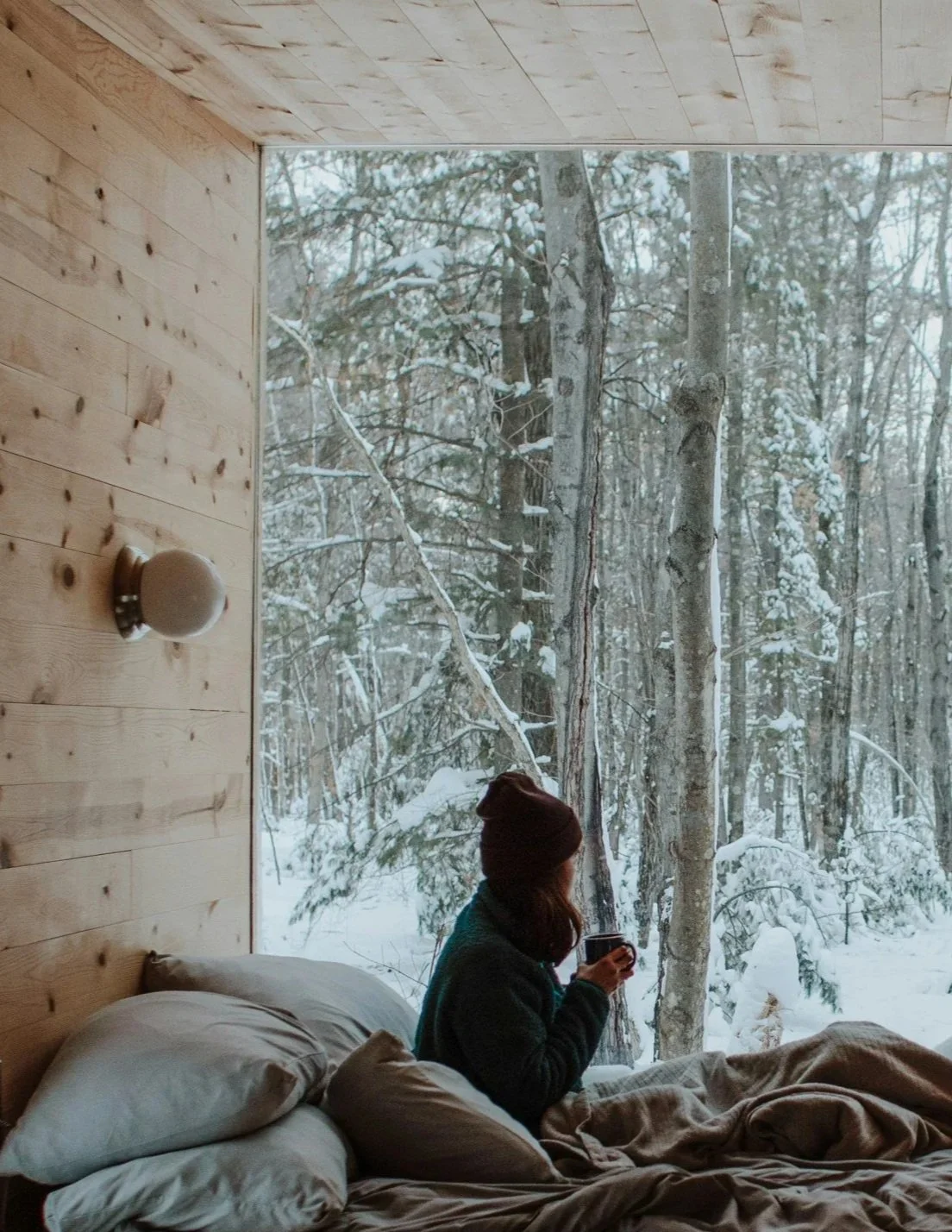 Woman in tiny home winter coffee