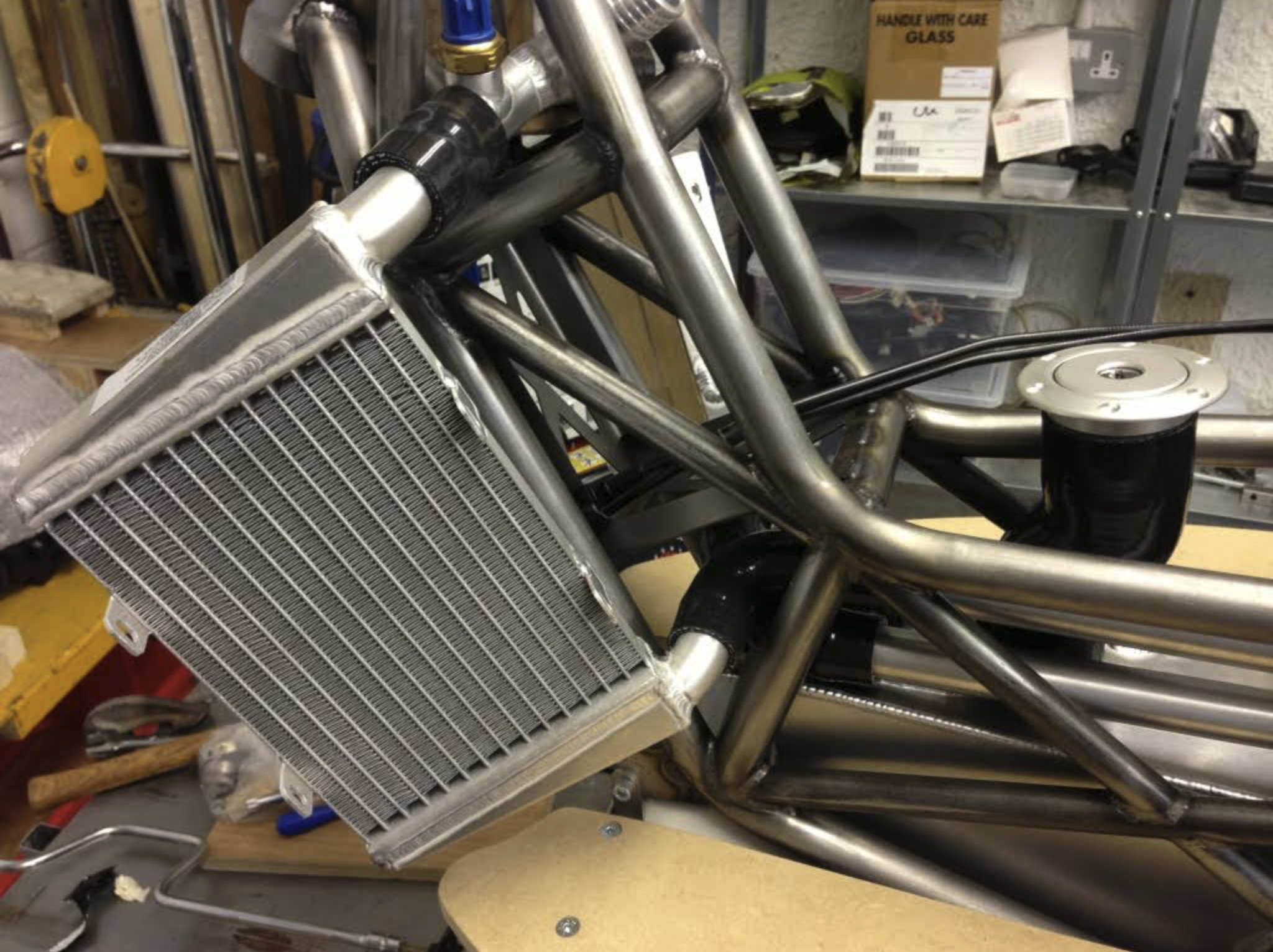 Prototype mock-up on the scooter's bare chassis