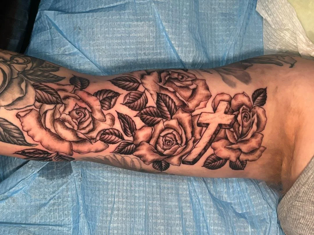 Black and Gray Rose Tattoo and Stone Cross