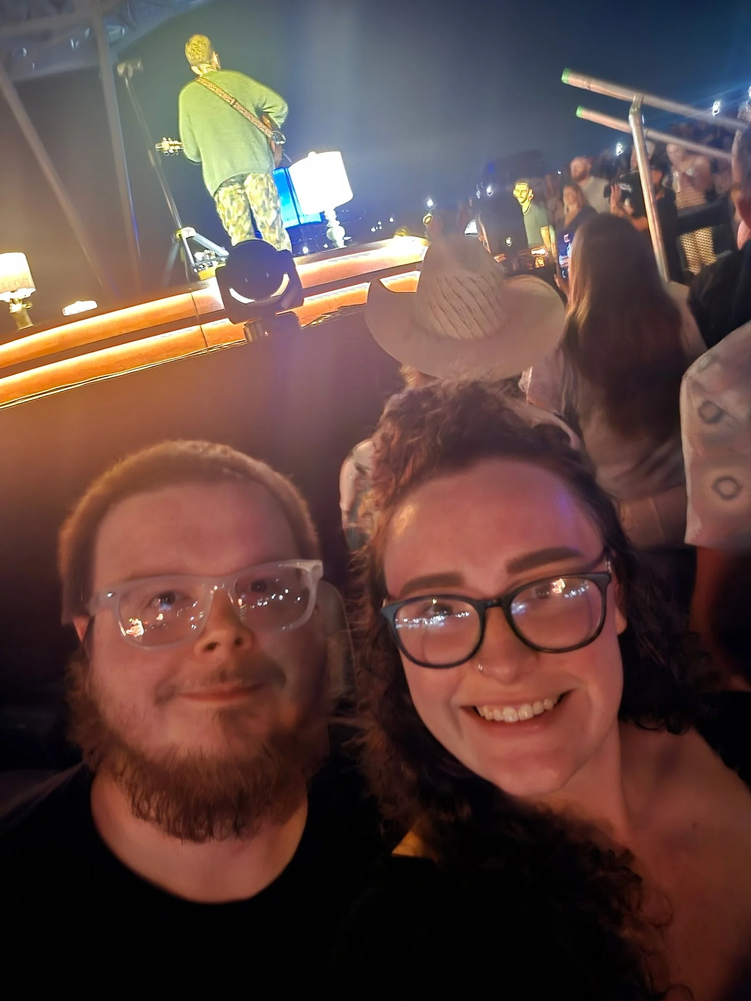 Us and Tyler Childers (he was busy so he couldn't get in the photo better)