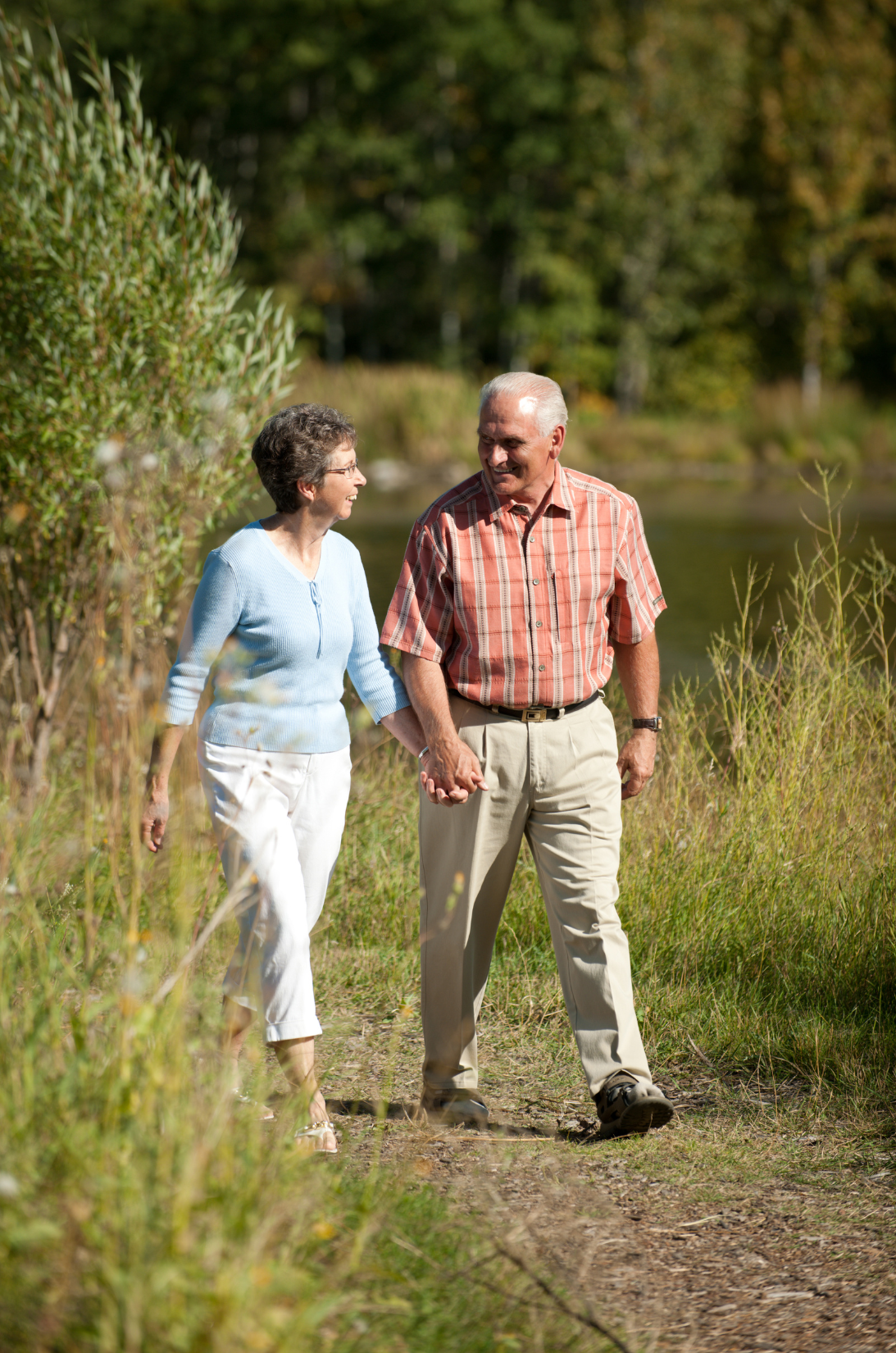 Reverse Mortgage Couple in Canada Walking.png
