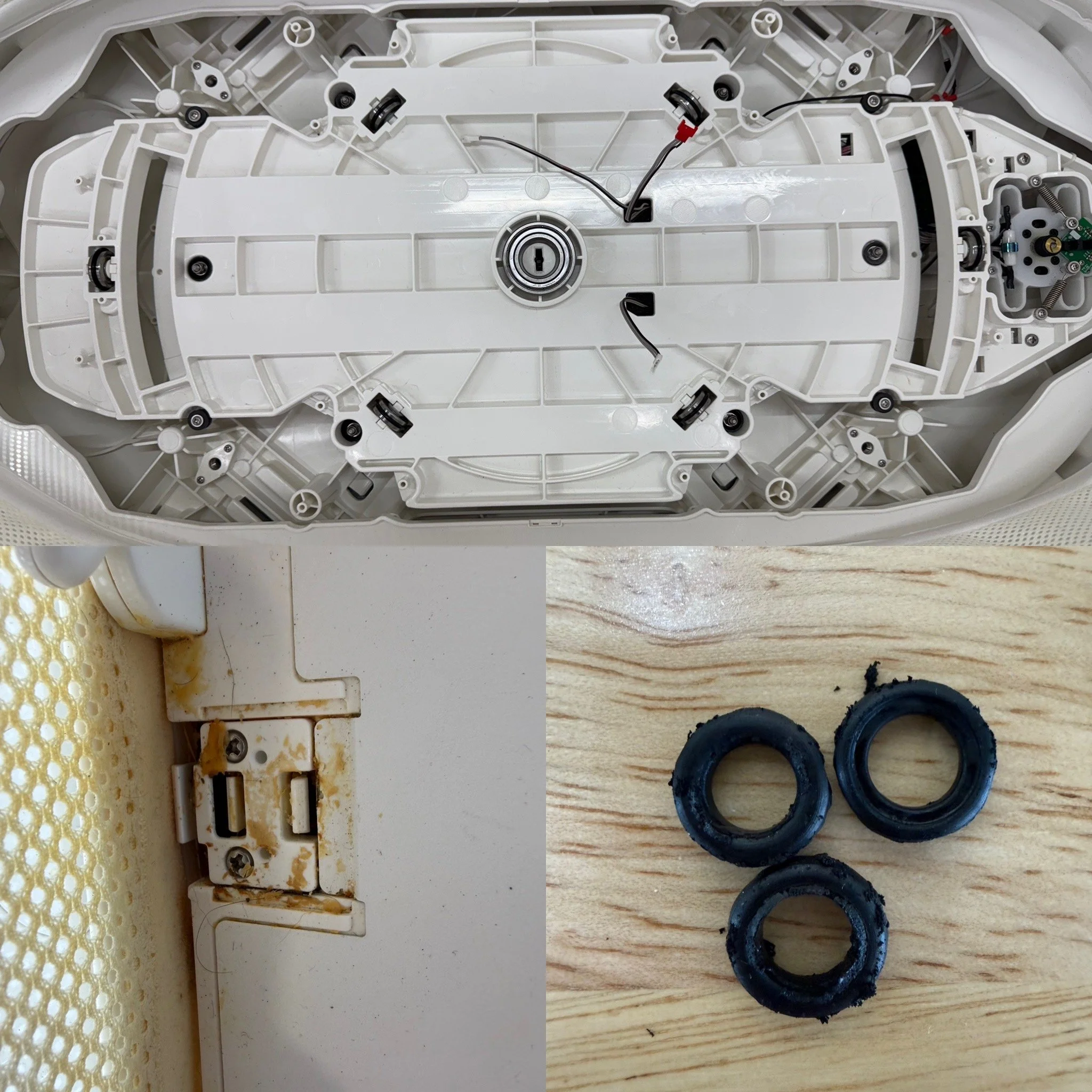 Internal view of a SNOO with visible wiring, screws, and mechanical components on a wooden surface, with black rubber rings in the foreground.