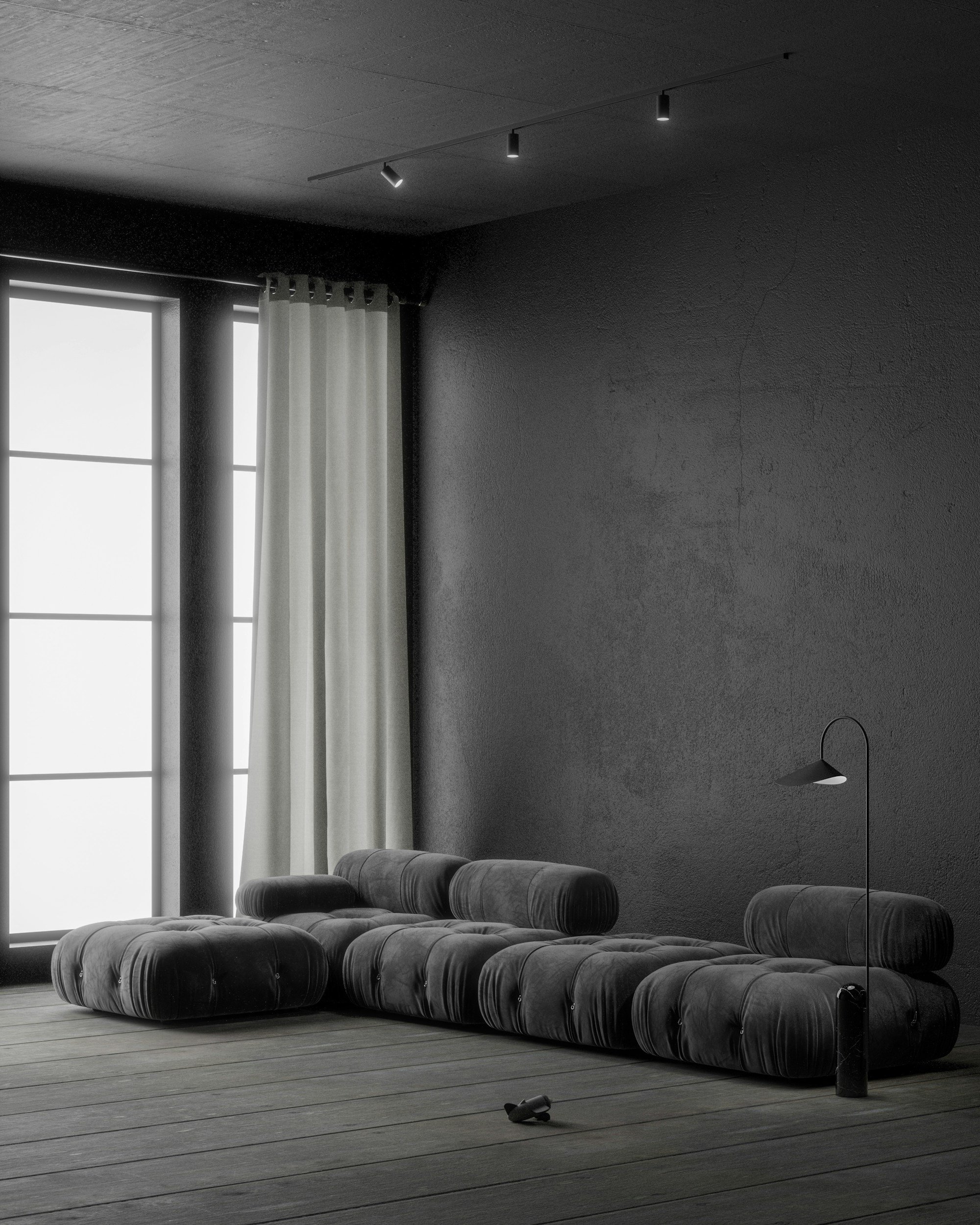 A minimalist living room with a black tufted sofa, a tall lamp, and a large window with white curtains, in a monochrome color scheme.