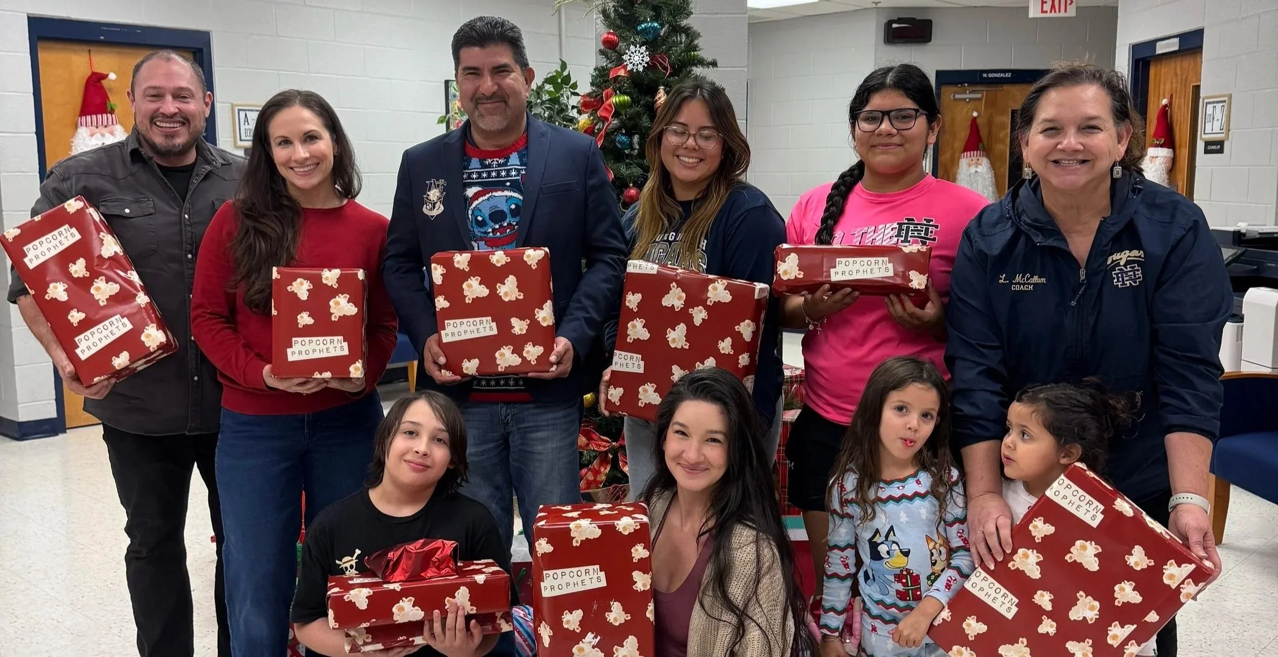 Popcorn Prophets and ENHS Students Spread Holiday Cheer to Local Children