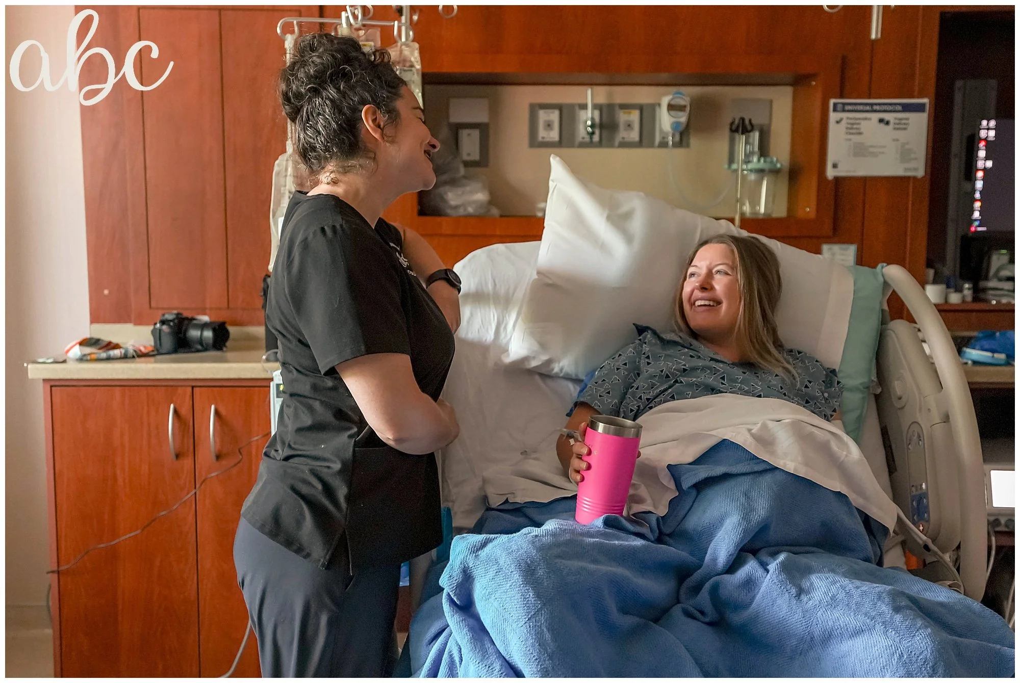 Woodstock Doula Photographer Maegan Hall visits with her client and Emory Johns Creek Hospital