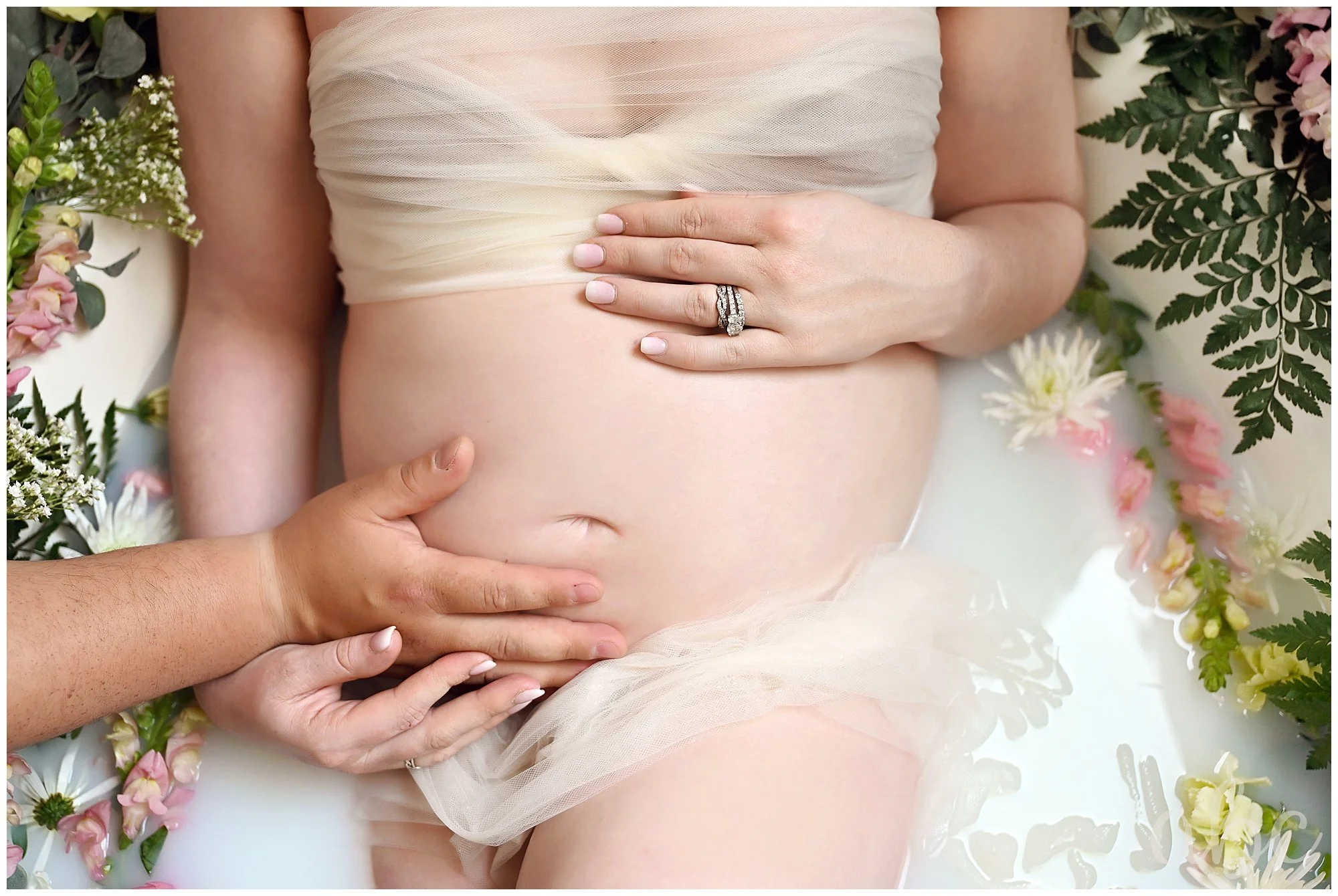 Atlanta doula and maternity photo of pregnant mother resting in milk bath